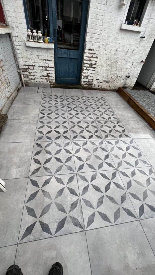 Porcelain patterned tiles grey The new tiled area