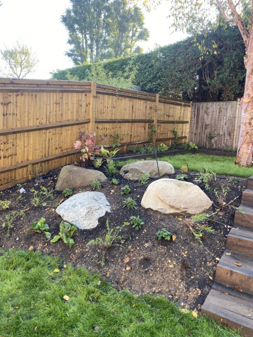 Boulders and planting Boulders and planting