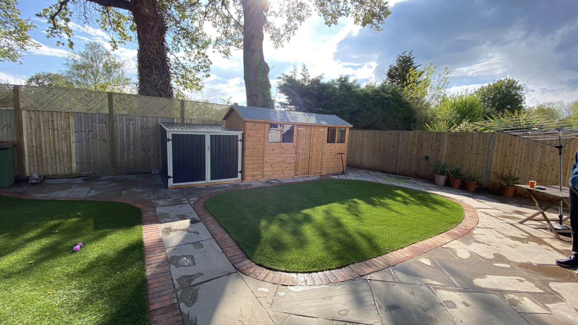 The new fencing and sheds Landscaping in phases