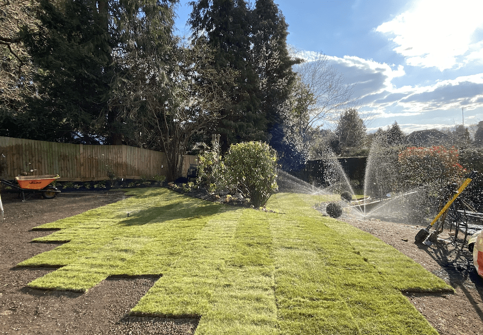 New lawn being irrigated Irrigation in Dorking