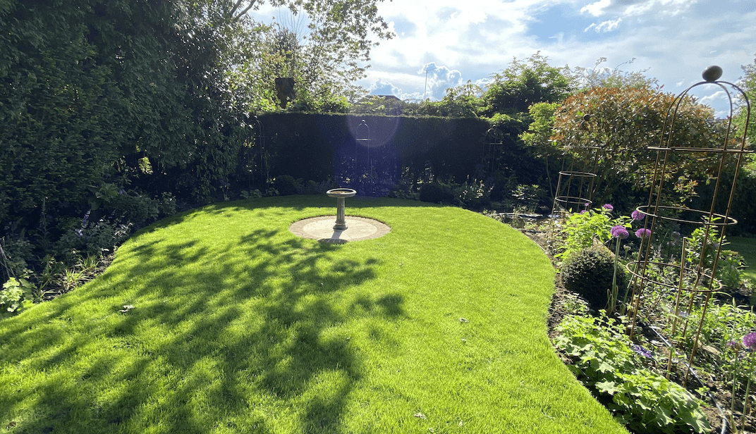 Planting and turfing Circular lawn with central feature