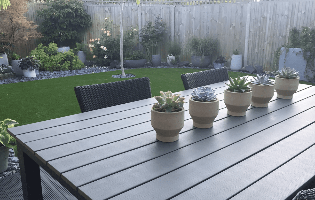https://www.ayegardening.co.uk/muck-away-services-surrey-and-sussex/ Black decking and artificial grass
