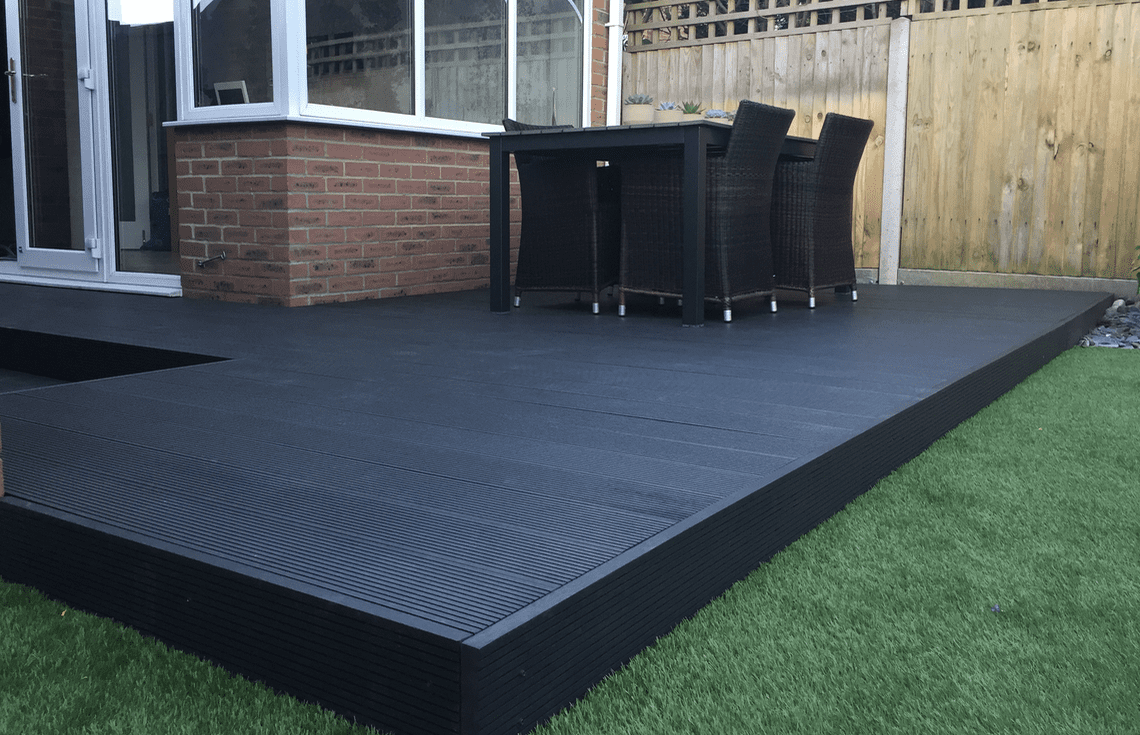 Black composite decking installed in Horsham Composite decking