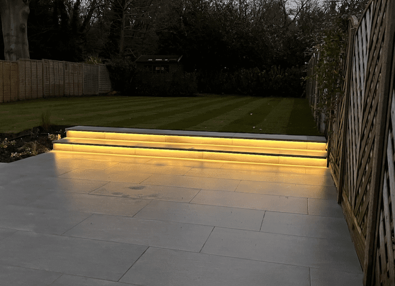Porcelain steps lit up at night Strip lighting on porcelain steps