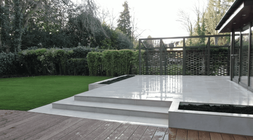 Installation of raised porcelain patio Raised patio installer