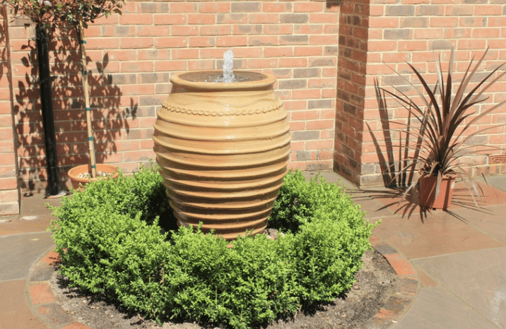 Water feature with planting
