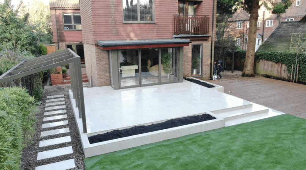 Raised porcelain patio with raised beds Porcelain patio and raised beds