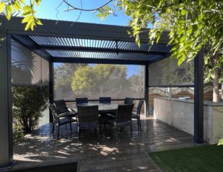 Metal pergola and Millboard decking