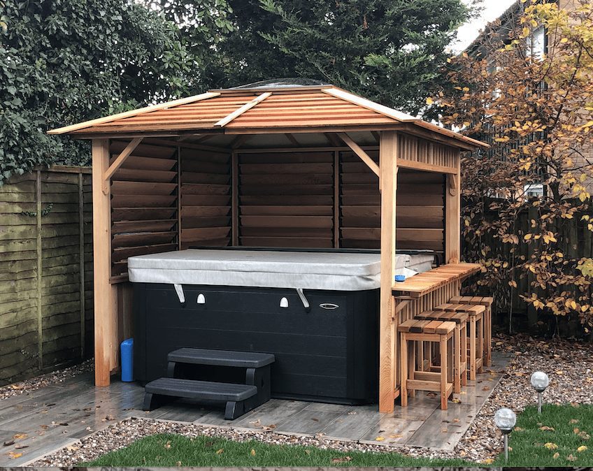 Wooden gazebo over a hot-tub